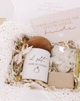 Happy Engagement gift box for bride with funny ceramic mug, wooden coaster lid and gold spoon. velvet mrs ring box, gold diamond pen, and rose petal scented soap. handmade by bossy creations