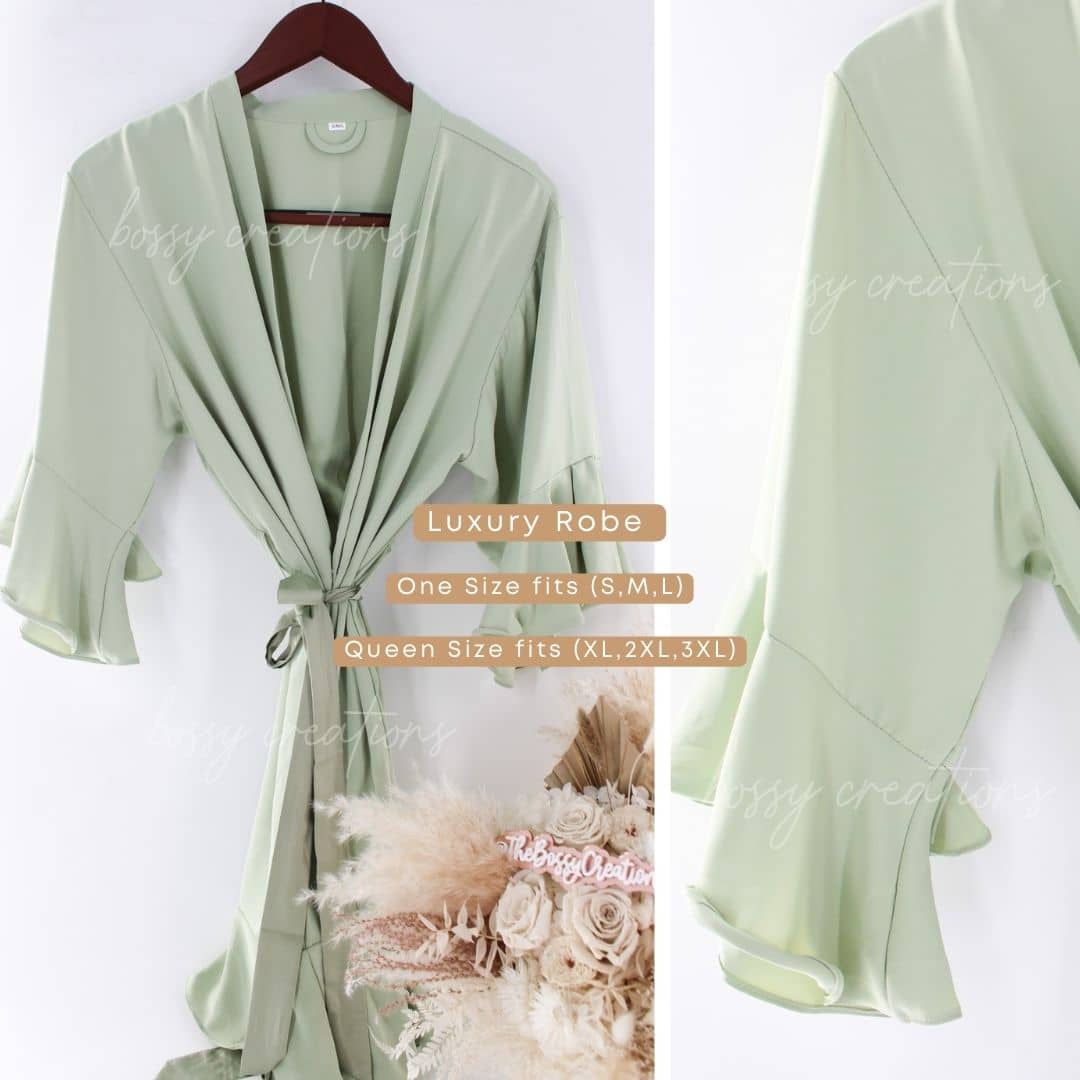 Modern Luxury Limited Edition Sage Green Large Gift Box for Bridesmaid Gifts. Includes Sage Green Robe, personalized champagne glass, scented candle, matches, organic soap, satin hair scrunchie, satin eye mask.